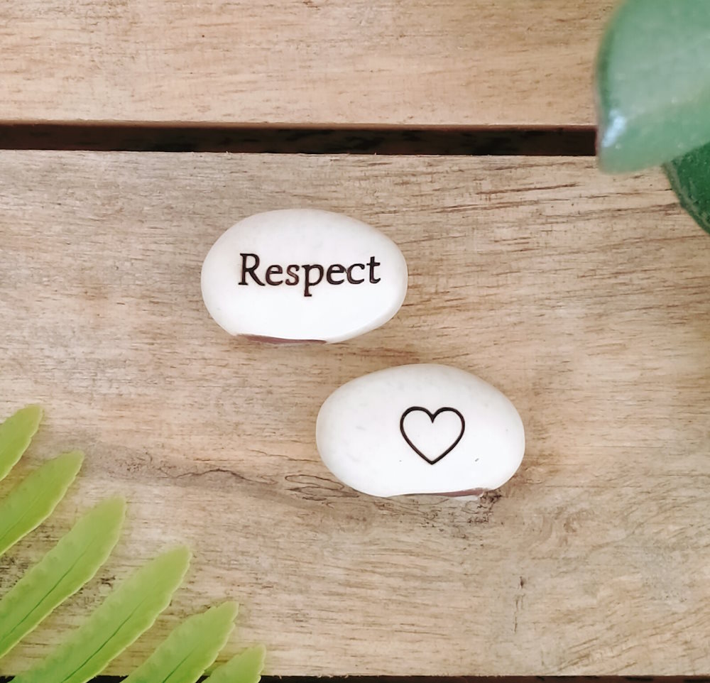 trinket gift item that says respect on it
