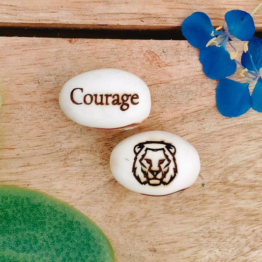 lion gift with the word courage on it